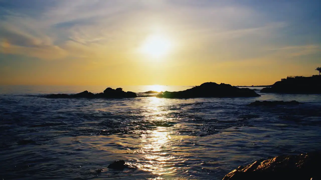 Cinemagraph loop of sun and ocean waves in slow motion