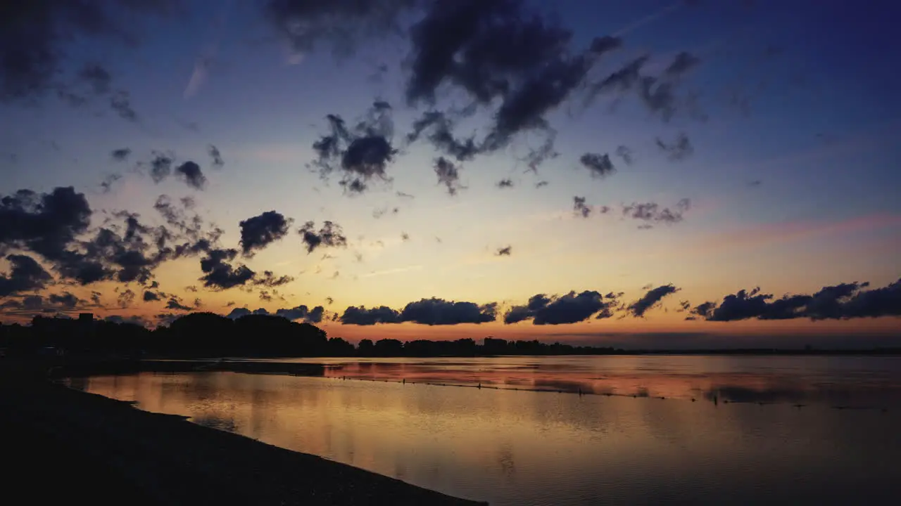 Warm sunset in summer with low and high clouds