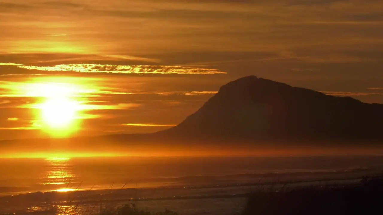 Sunrise over headland Denia Spain