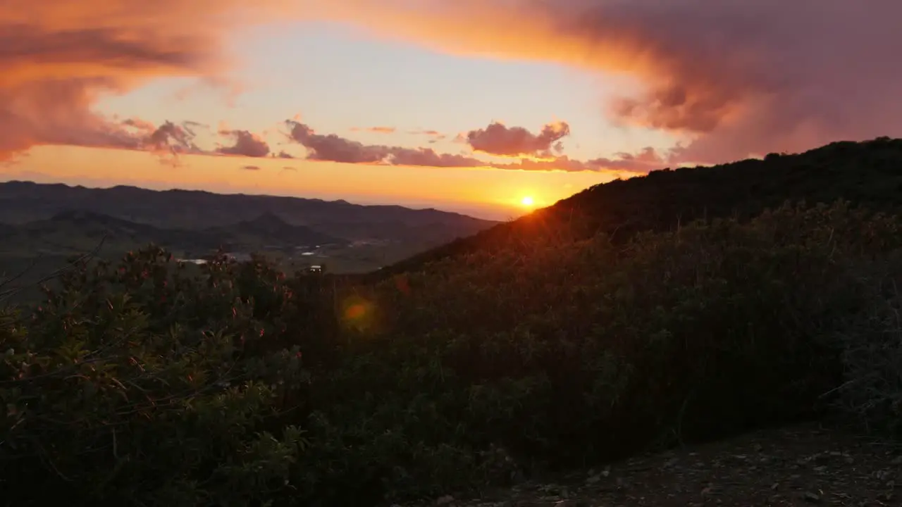 Sunrise from mountains over the ocean 