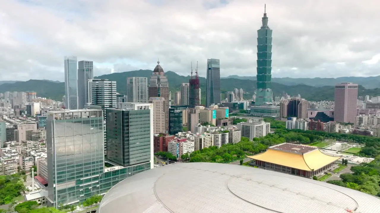 Aerial view over Taipei city with 101 tower Taipei Dome DaJudan and sun yat-sen memorial hall during cloudy day