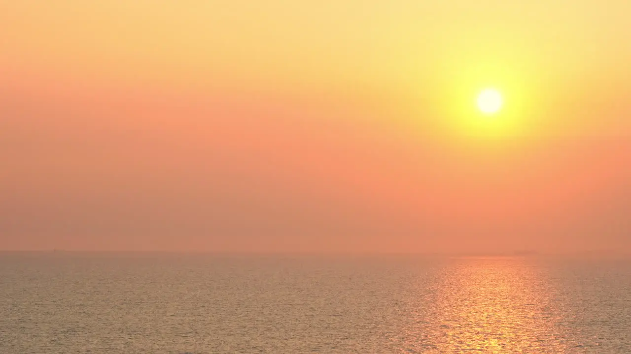 Glorious golden sunset over the sea orange and red color sky during sundown in exotic Bali