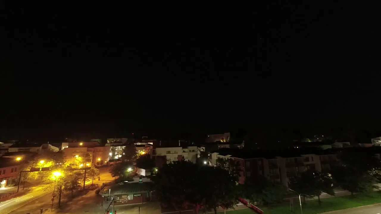 Time lapse of city at night to morning