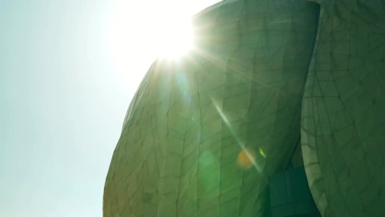 Sun through the marble structure of the Bahai Temple of South America Santiago on a clear day