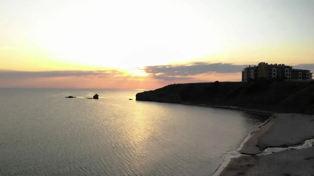 Aerial panning footage of sunrise over sea and seashore  Bulgaria-2