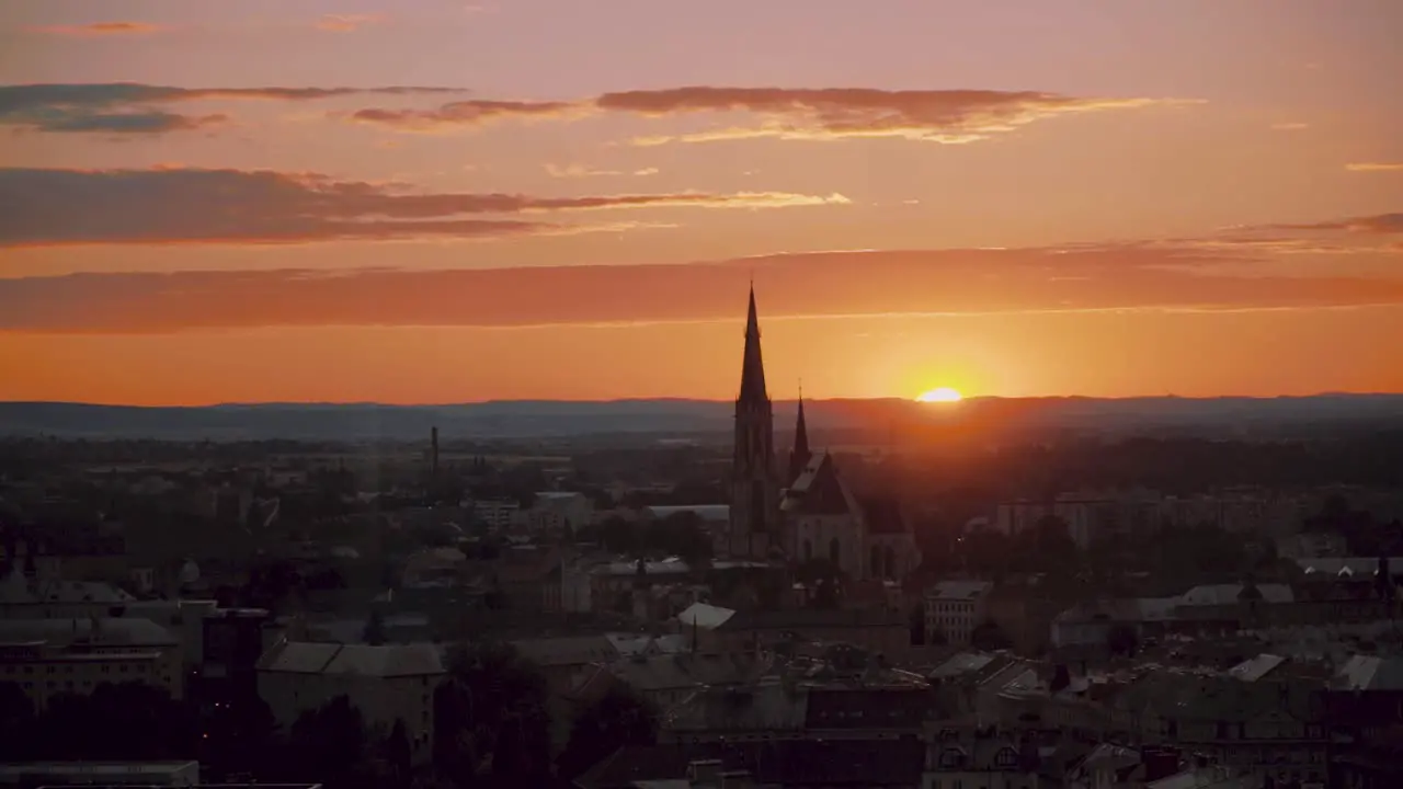 Colorful Sunset Skyline Above European City Focus In church