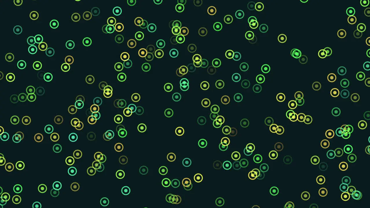 Circular pattern of green and yellow circles on black background