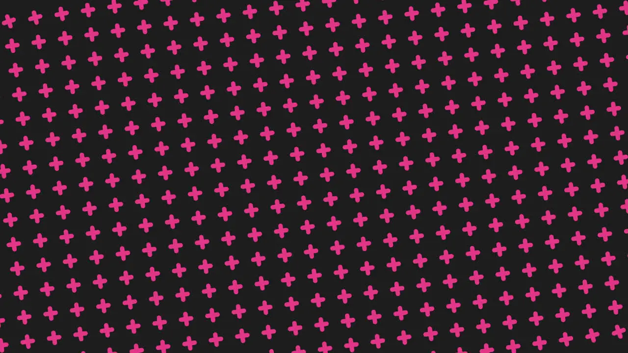 Geometric cross pattern black and pink dots on repeat