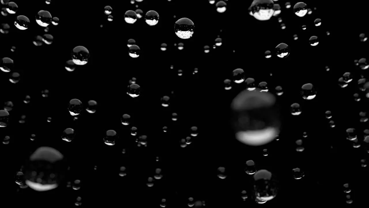 Water droplets rain close up falling DOF slow motion 4K