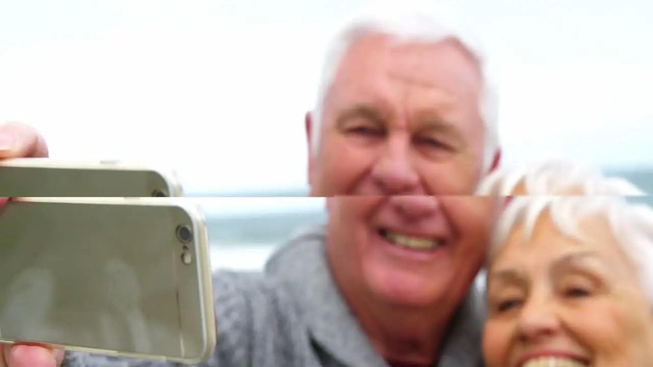 Senior couple taking a selfie from mobile phone