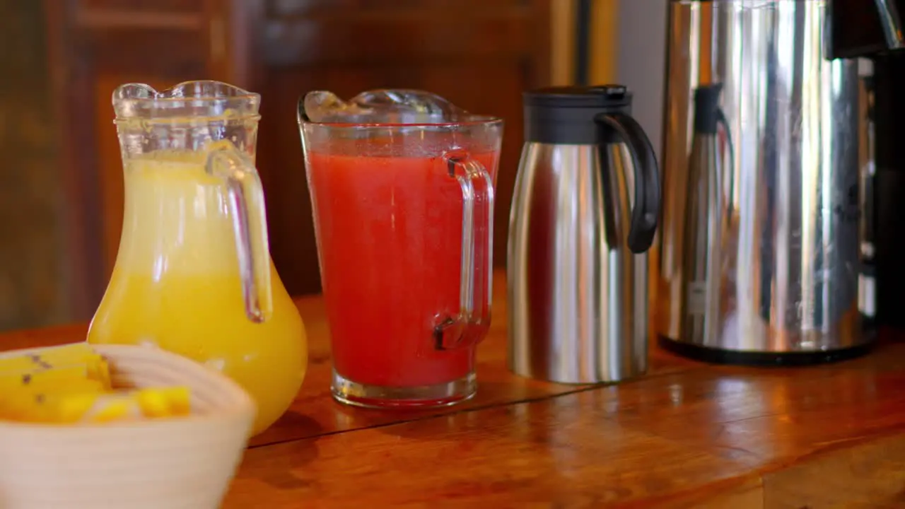 hotel table with pineapple juice strawberry and coffee maker with grain coffee