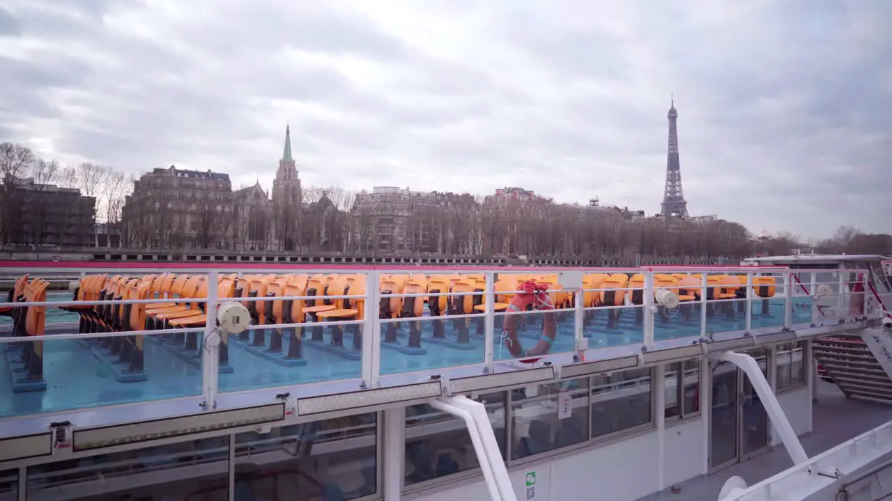 Empty tourist river boats in Paris during lockdown during the Covid-19 pandemic with view of the Eiffel Tower tourism in France