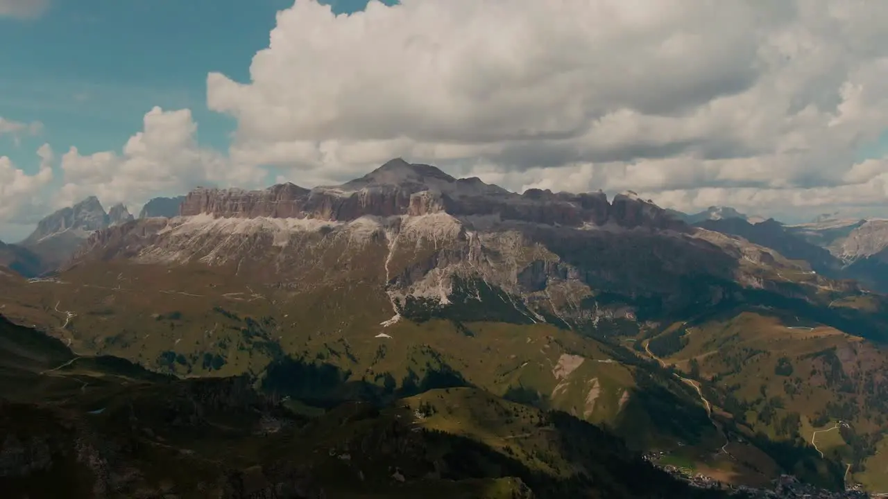 Steep mountains alps rocks cliffs and open fields