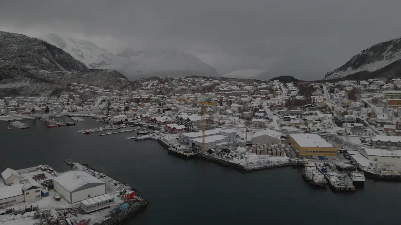 Aerial View On The Harbor Of The Small Town Of Skjervoy On A Cloudy Day Of Winter In Troms County Norway drone shot