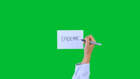 Doctor Writing Epidemic on Paper with Green Screen 02