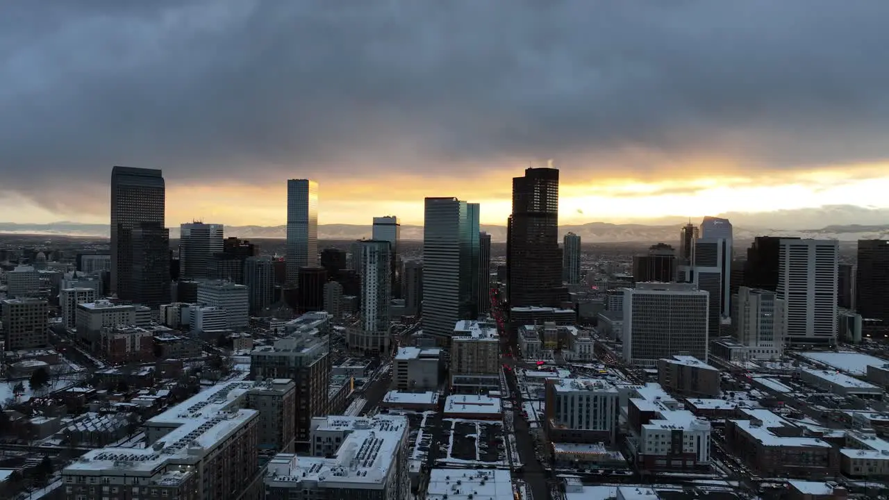 Aerial view of downtown Denver Colorado covered in a blanket of snow at sunset