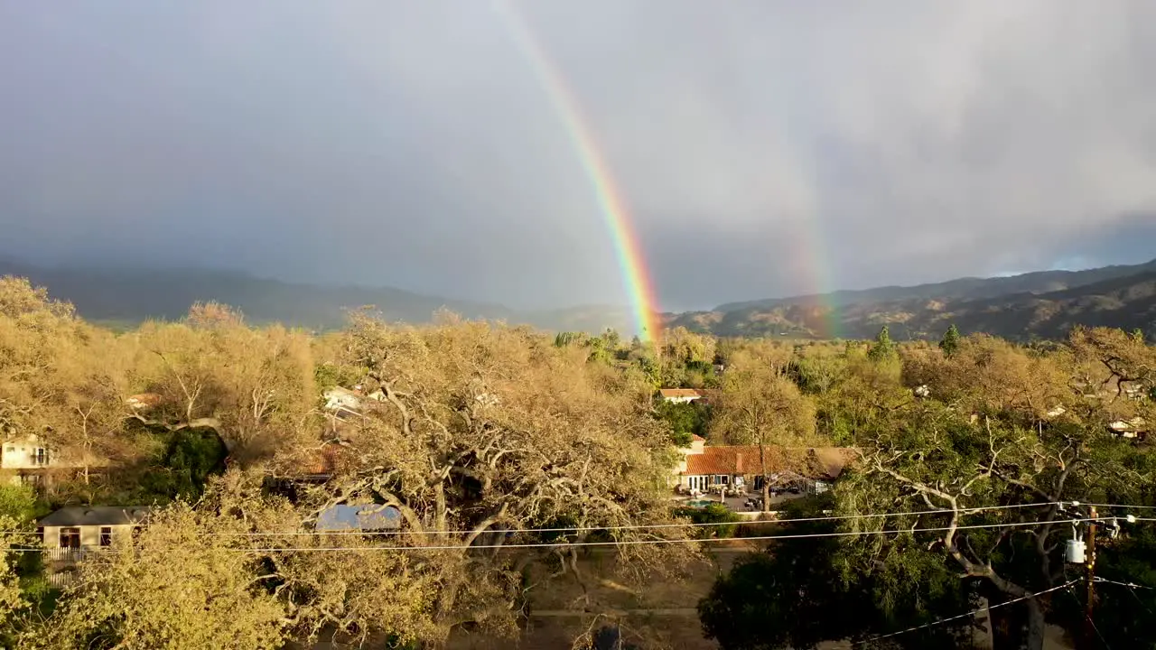 Excellent Aerial Shot Of A Rainbow Over A Suburb In Ojai California