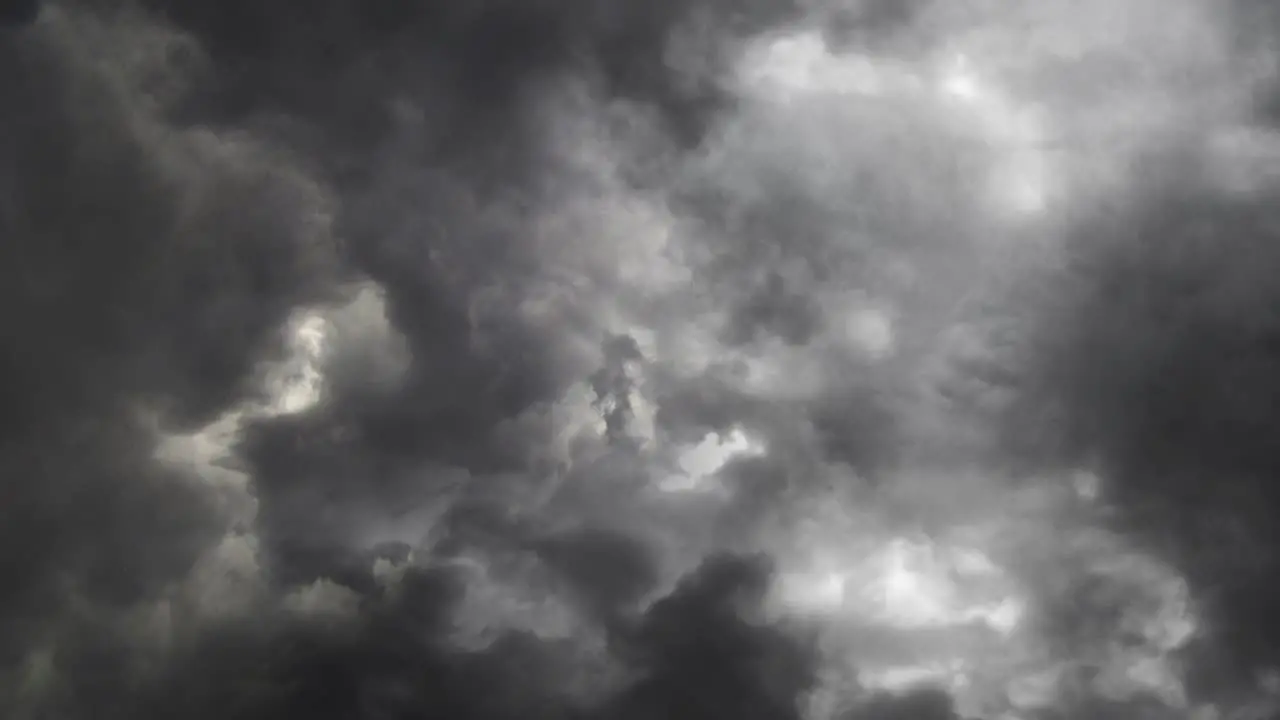 Lightning thunderstorm flash over the dark sky