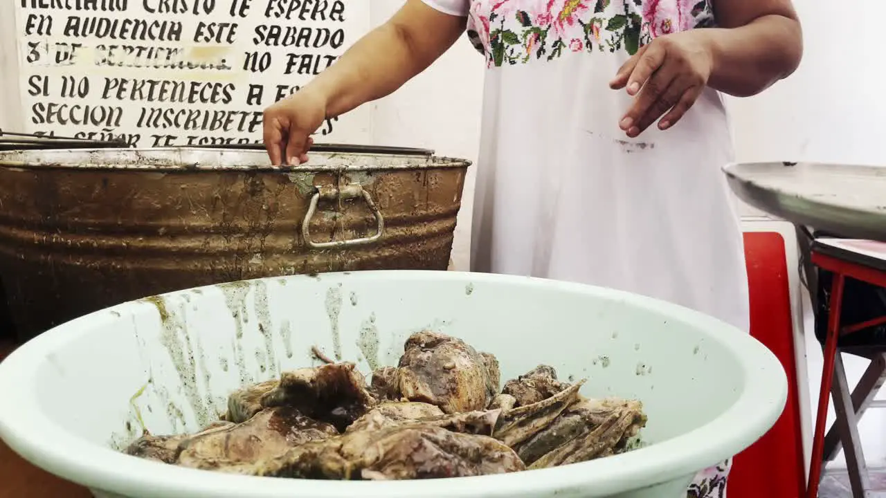 chef kitchen preparation of Yucatan mexico traditional food called "relleno negro