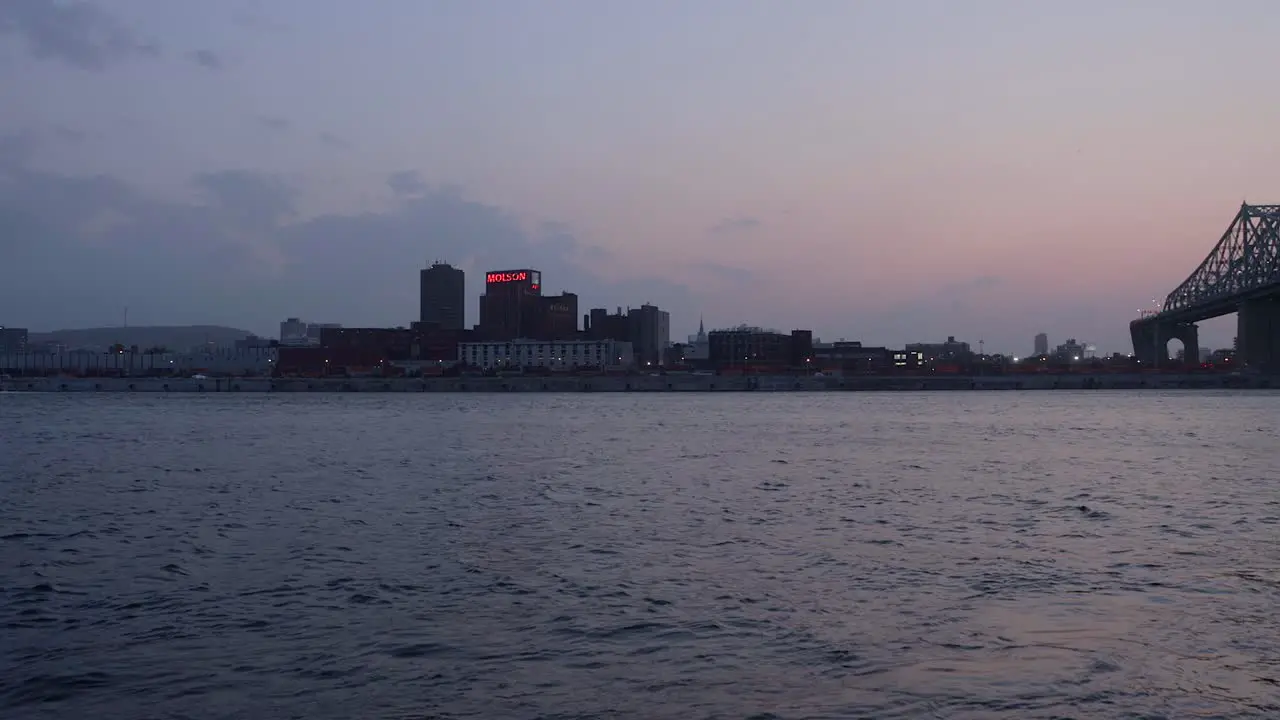 Port of Montreal from Across the River with the Jacques Cartier Bridge to the Right at Dusk