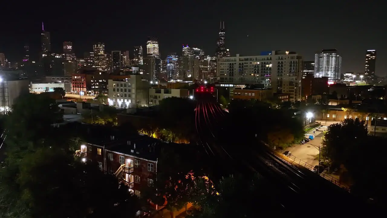 Static drone shot of the empty railway tracks in River West night in Chicago USA