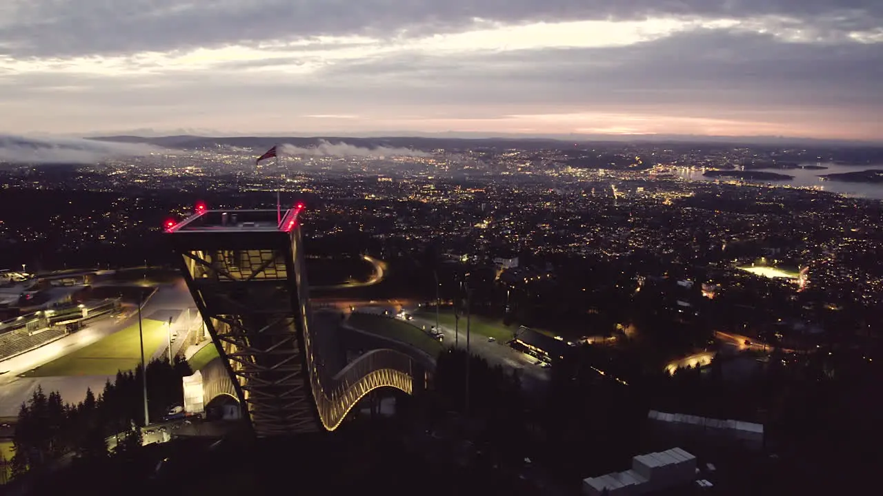 Aerial View Of Holmenkollbakken With City Views At Night In Oslo Norway