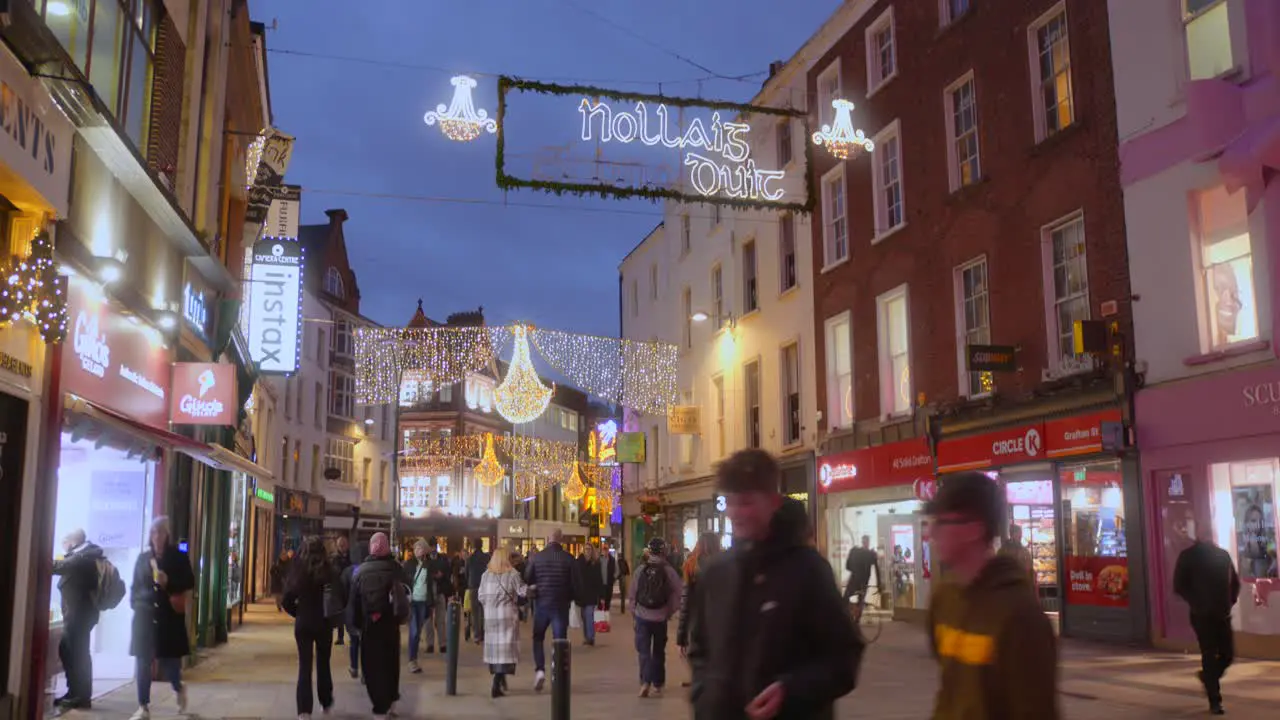 Tilt down establisher Dublin shopping street in Christmas beautiful decorations