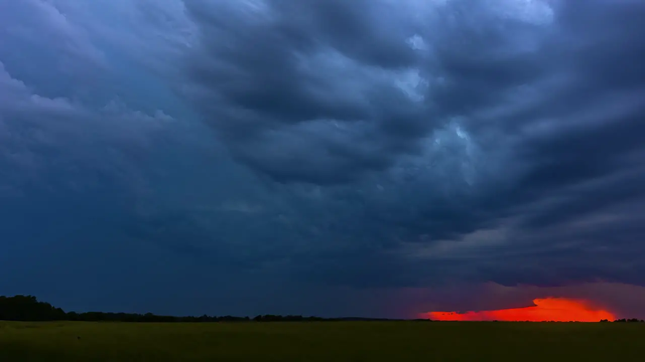 Rainy monsoon clouds storming over agricultural farmlands