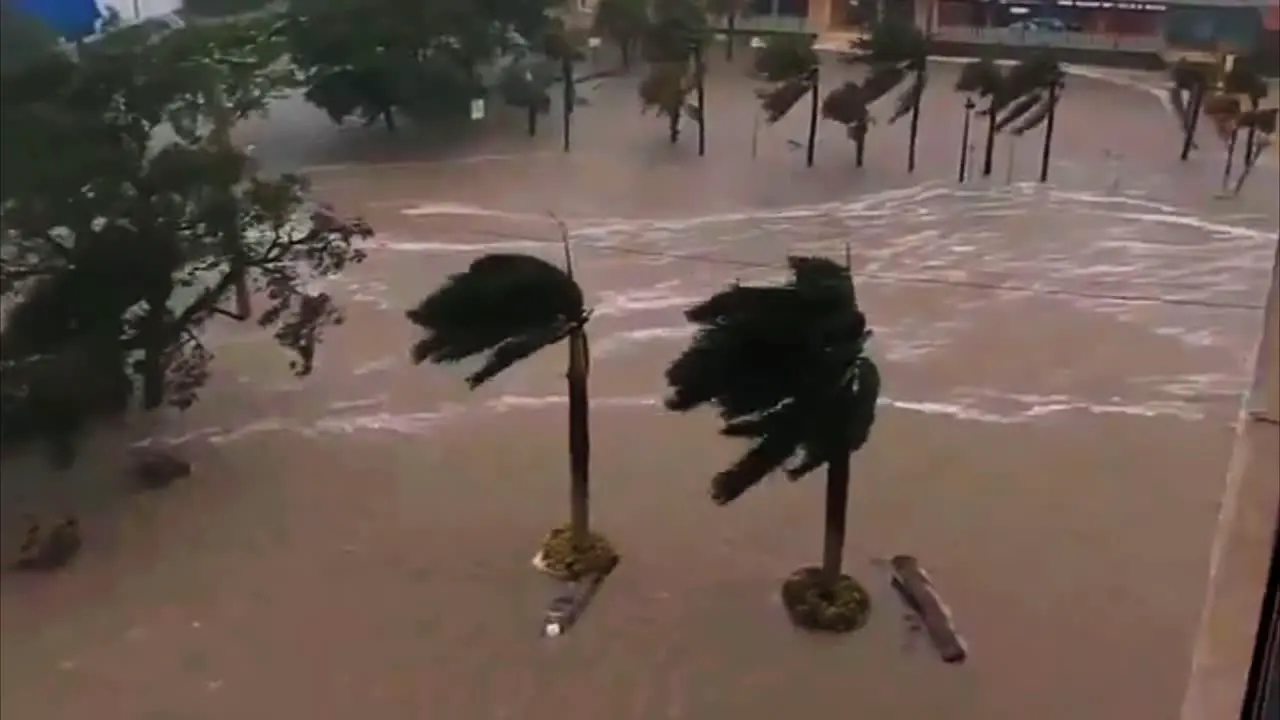 Hurricane Ian category 4 in Florida West Coast with Yachts and Cars Passing Houses Looking Through a Pane of Glass with High Winds