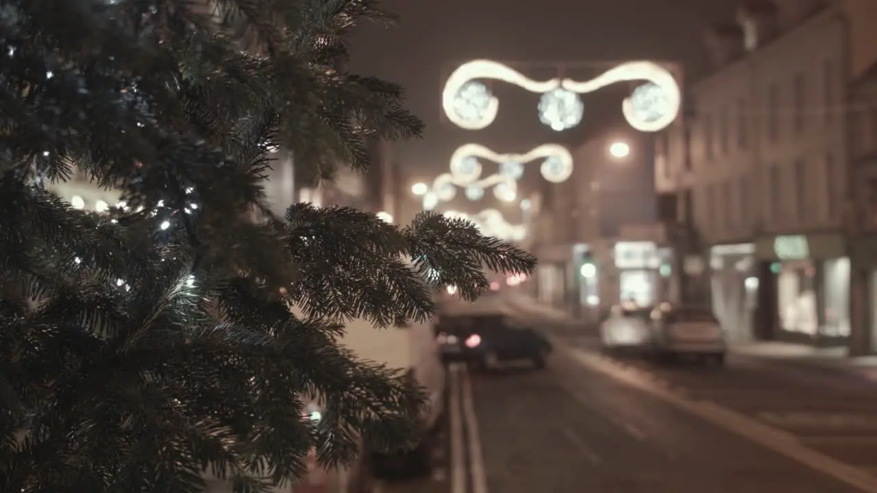 Christmas tree festive lights on street rack focus