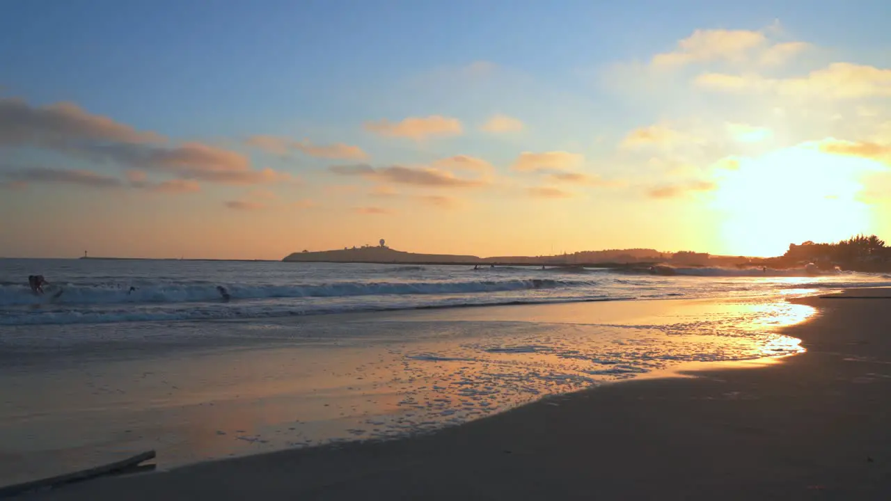 Pillar Point from El Granada Cloudy Sky Beatiful Sunset and Surfers Riding the Waves