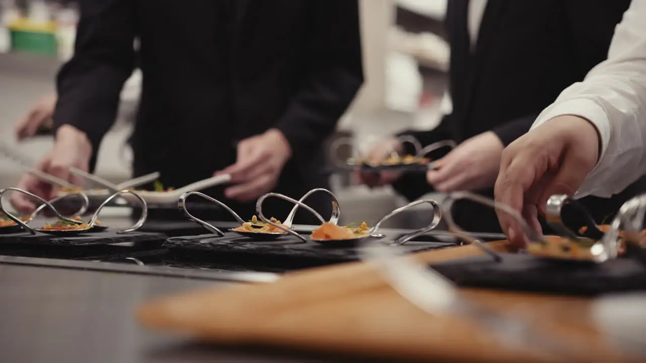 Waiters serving food at a restaurant