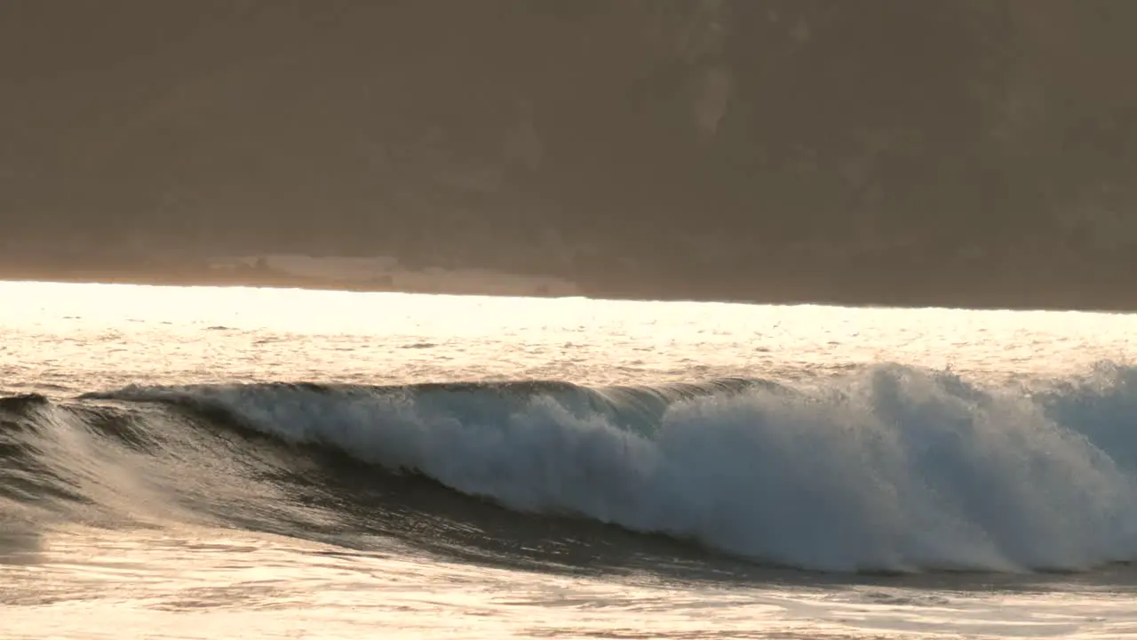 View on the reef and the waves of Seger near Kuta Lombok during sunset