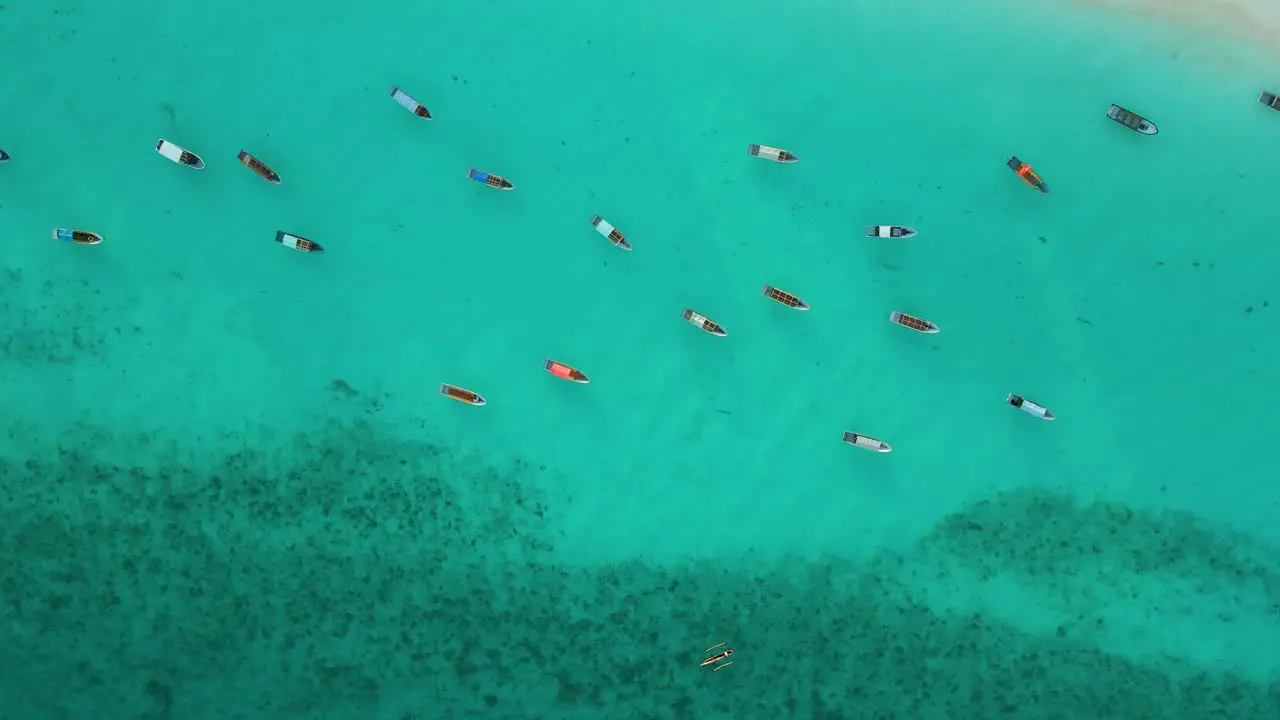 Nungwi Beach Zanzibar Tanzania June 18 2022 Boats on the Indian ocean on a sunny cloudy day during sunrise