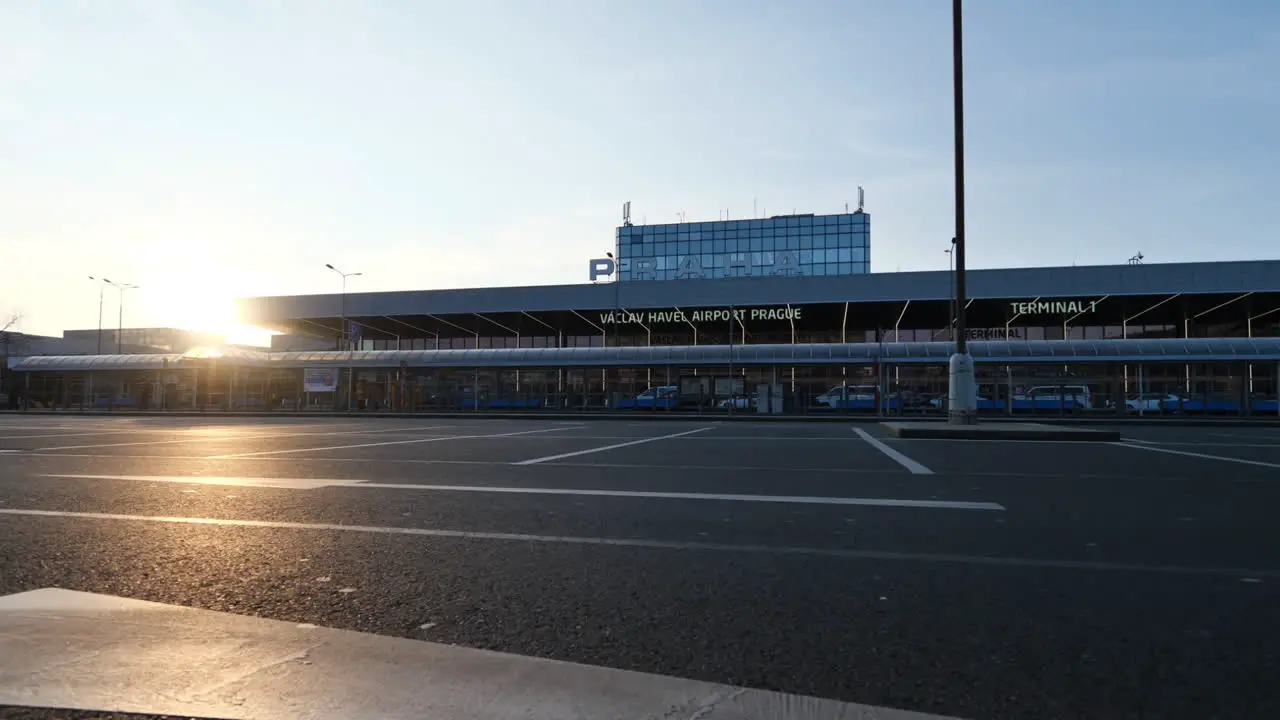 Empty Parking Lot in Front of Vaclav Havel Prague Airport and Terminal Building During Covid-19 Virus Pandemic and Travel Restrictions Low Angle Slow Motion