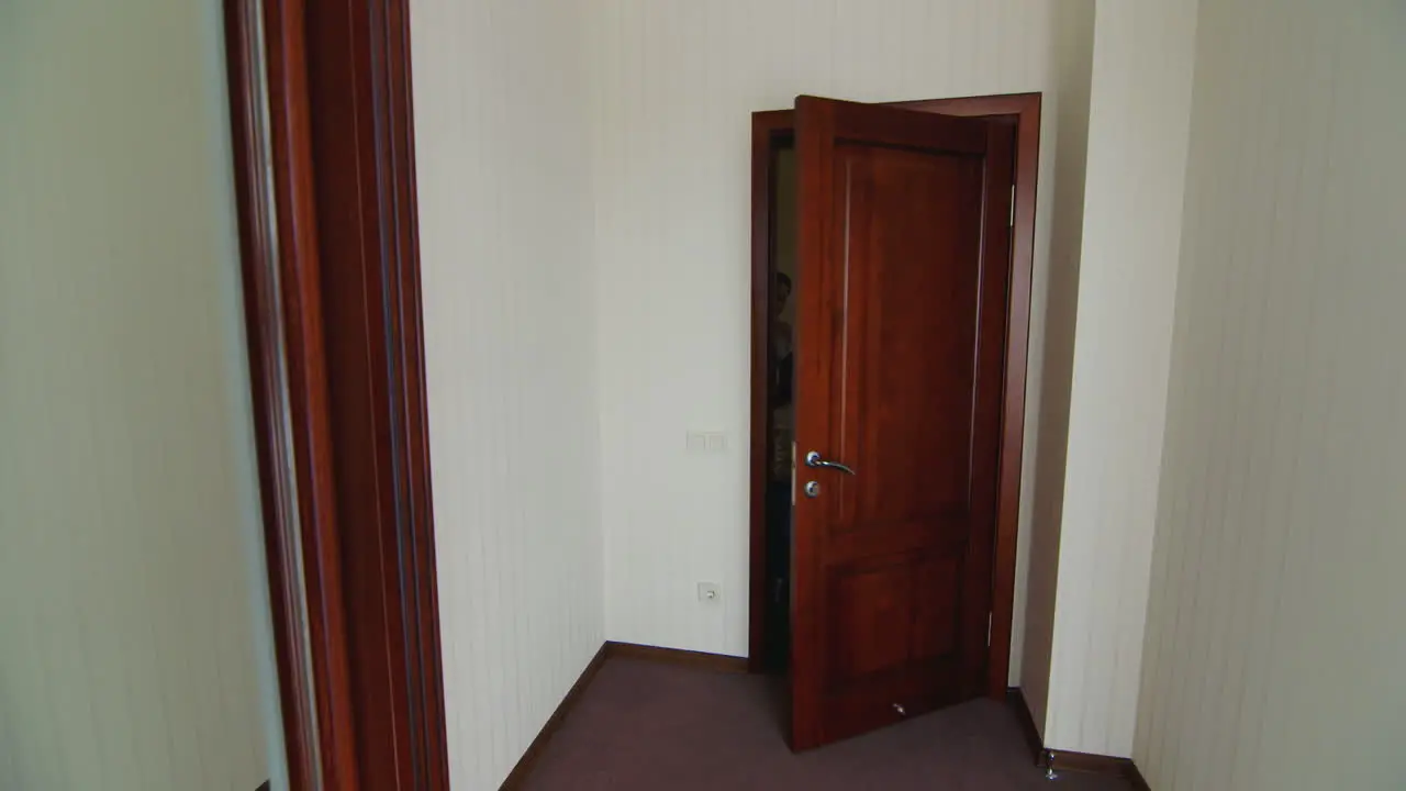 Family With Child Entering Hotel Room