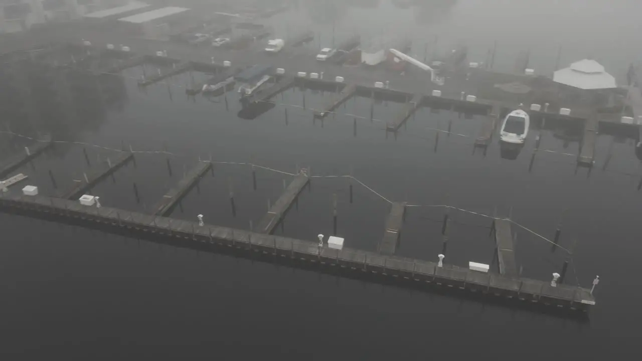 Dock covered in mist in autumn