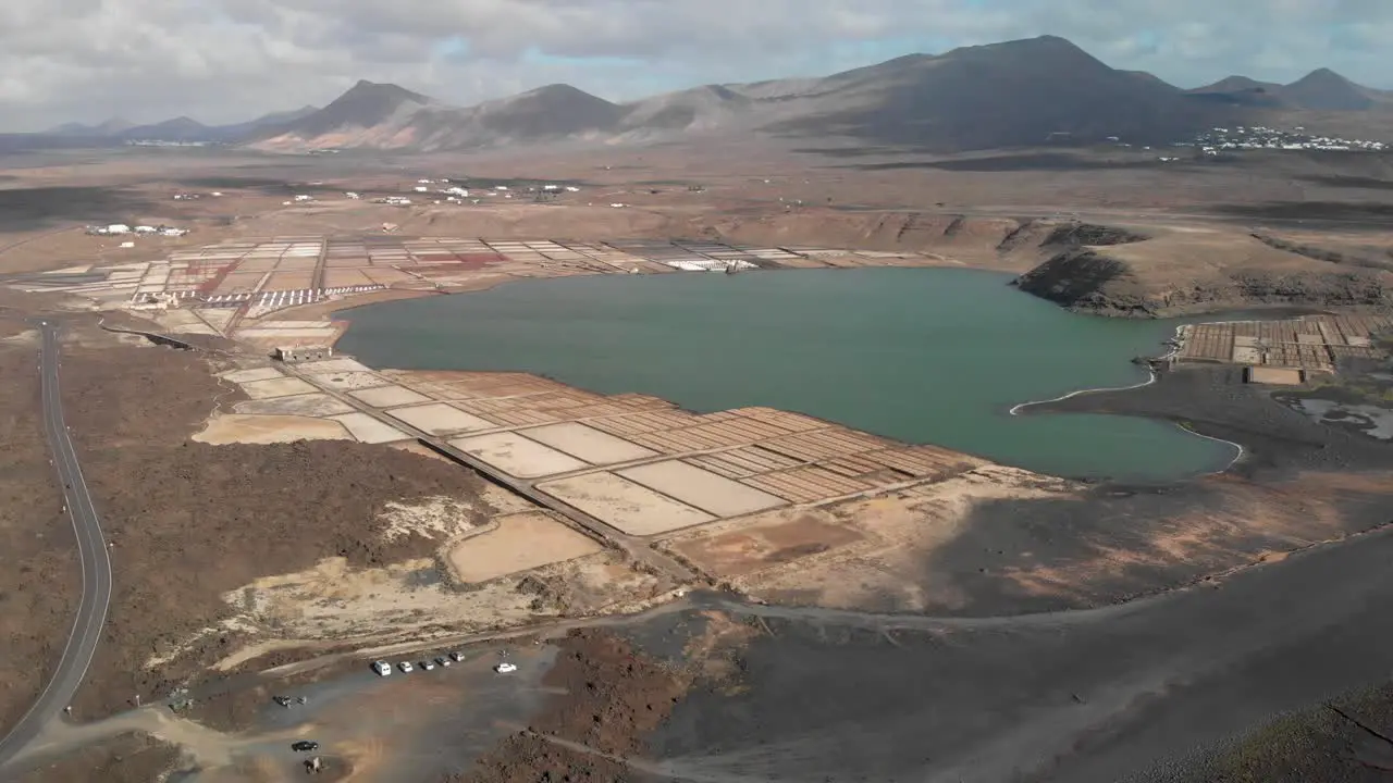 Pull back aerial view of a salt farming plant