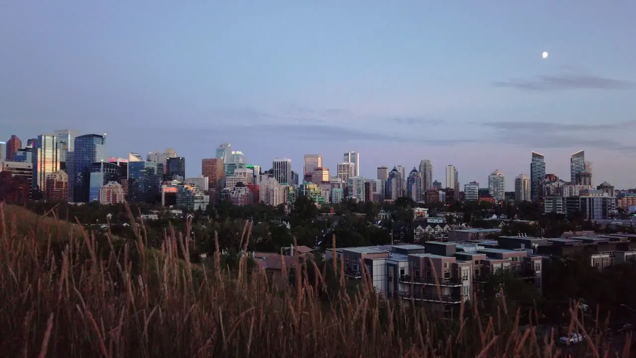 Skyline with grass with moon in evening static Calgary Alberta Canada