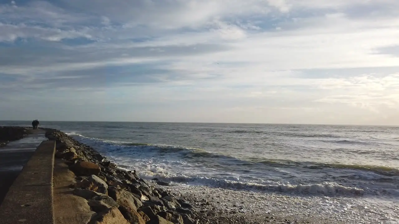 Walk along the sea cloudy