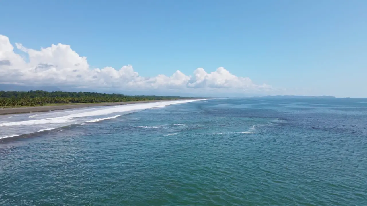 Curved flight over warm coastal waters at Playa Palo Seco Costa Rica