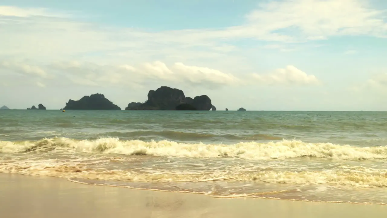 Looking at the island on the beach