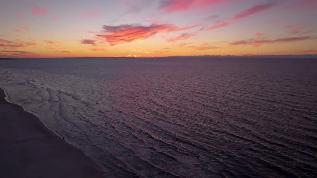 Aerial Drone Orange Sunset Skies Over Beach Of Krynica Morska Poland