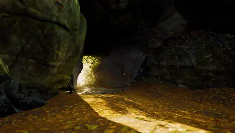 Empty road goes through the cave with glowing end