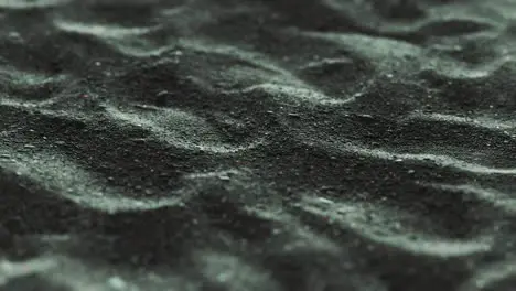 Black sand waves as background