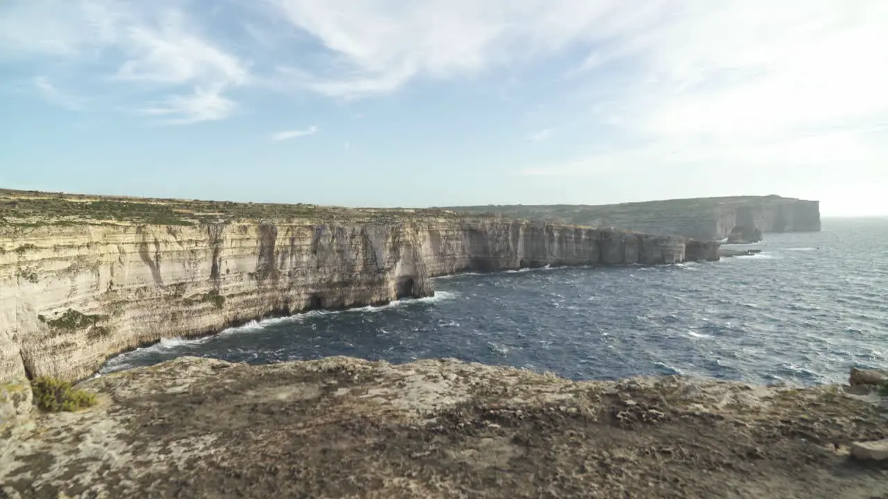 Revealing Cliffs near Azure Window and Strong Mediterranean Sea Raging on Winter Day