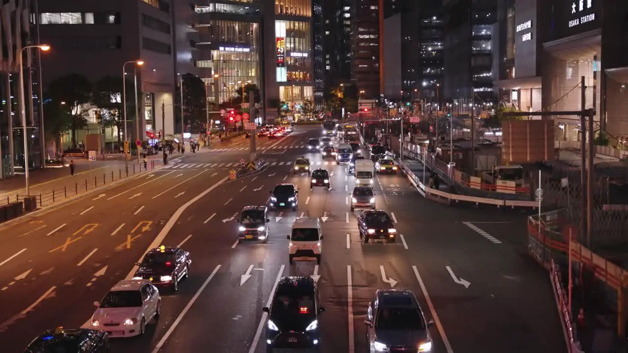 Downtown Osaka at night Cars Driving through Umeda District