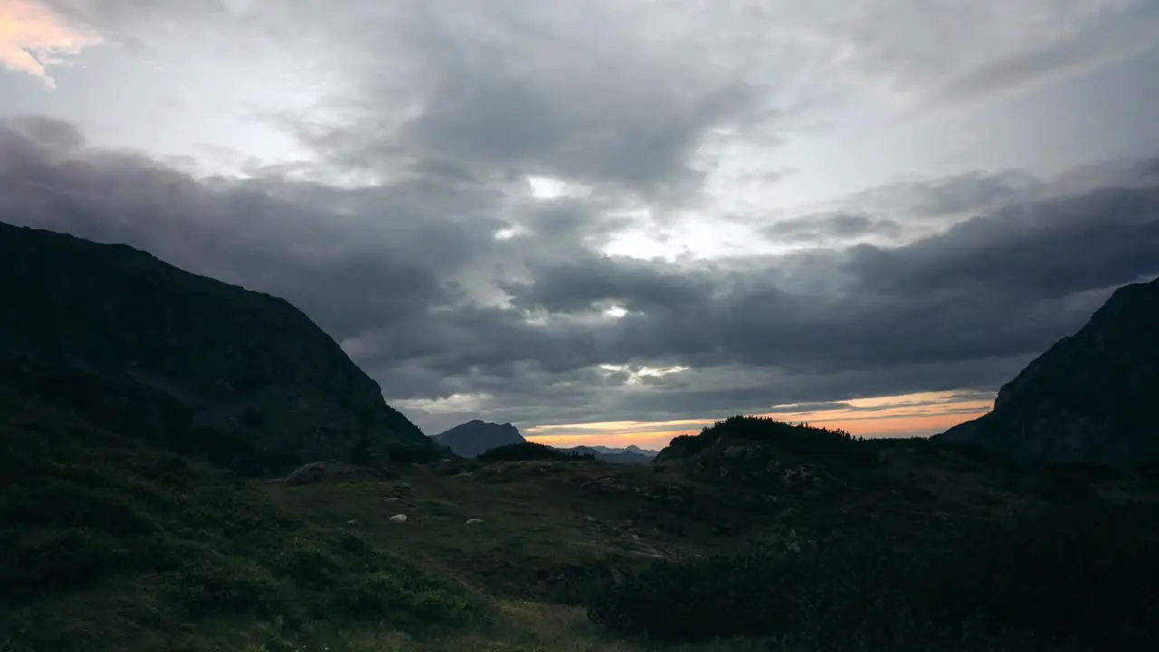 Timelapse Dark clouds rolling in on a mountain landscape in Austria