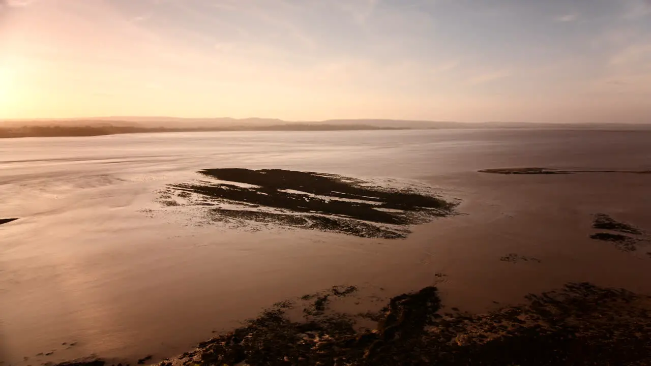 Stunning timelapse of the tide coming in covering rocks