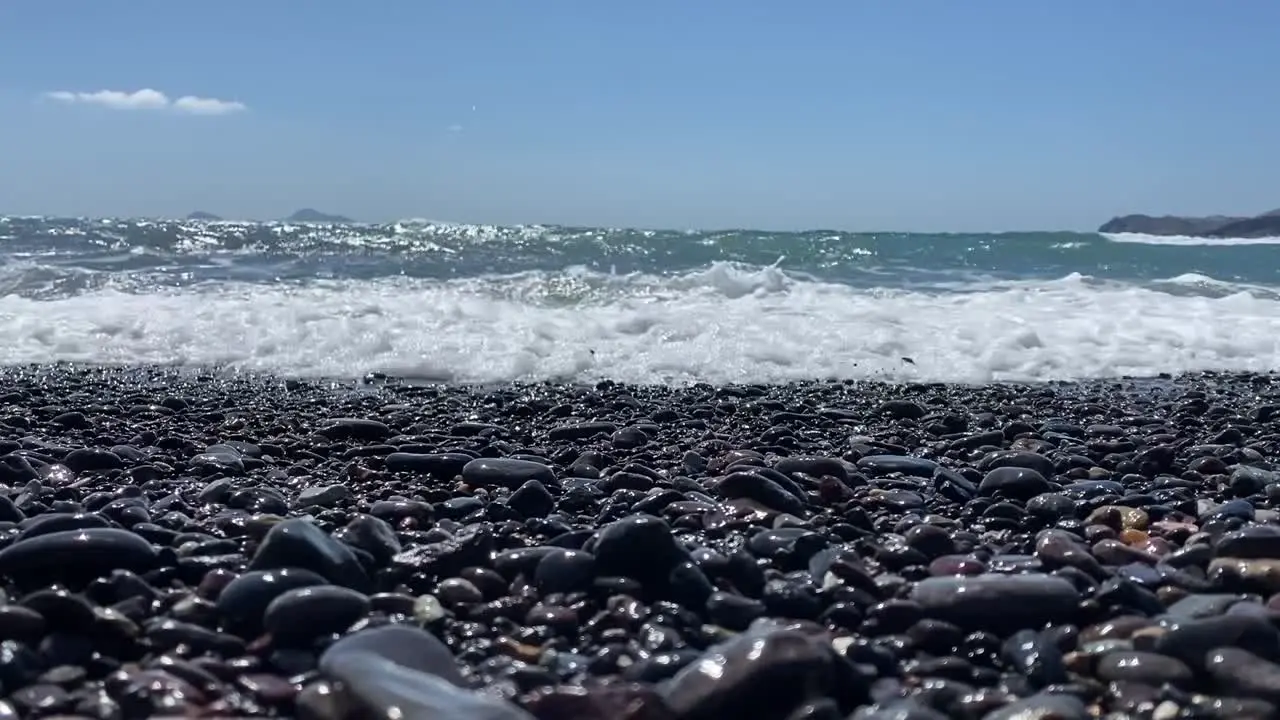 Beautiful Vichada Black Sand Beach in Santorini Greece on a Sunny Day-1